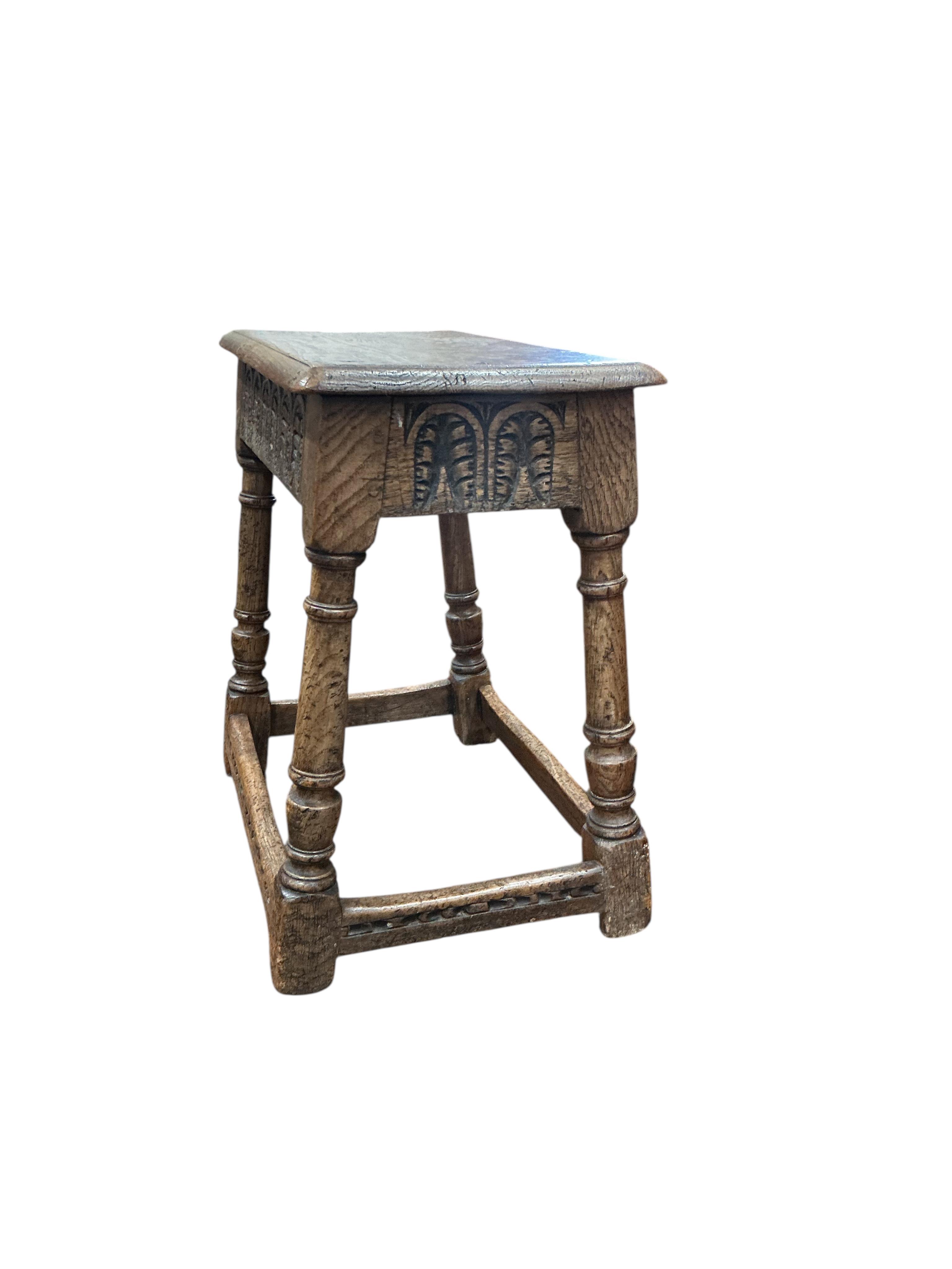 A 17th century style oak joint stool, width 49cm, depth 26cm, height 48cm